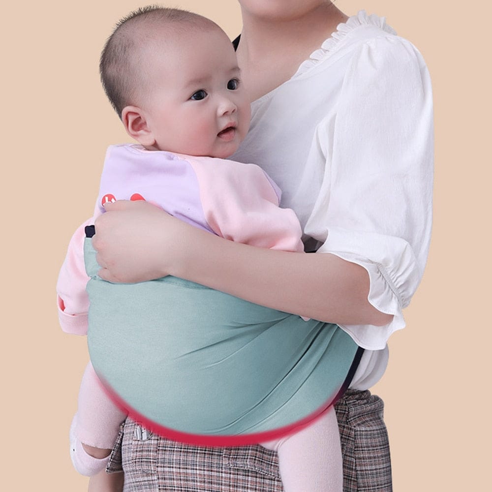 Babytrage als Schulterschlinge